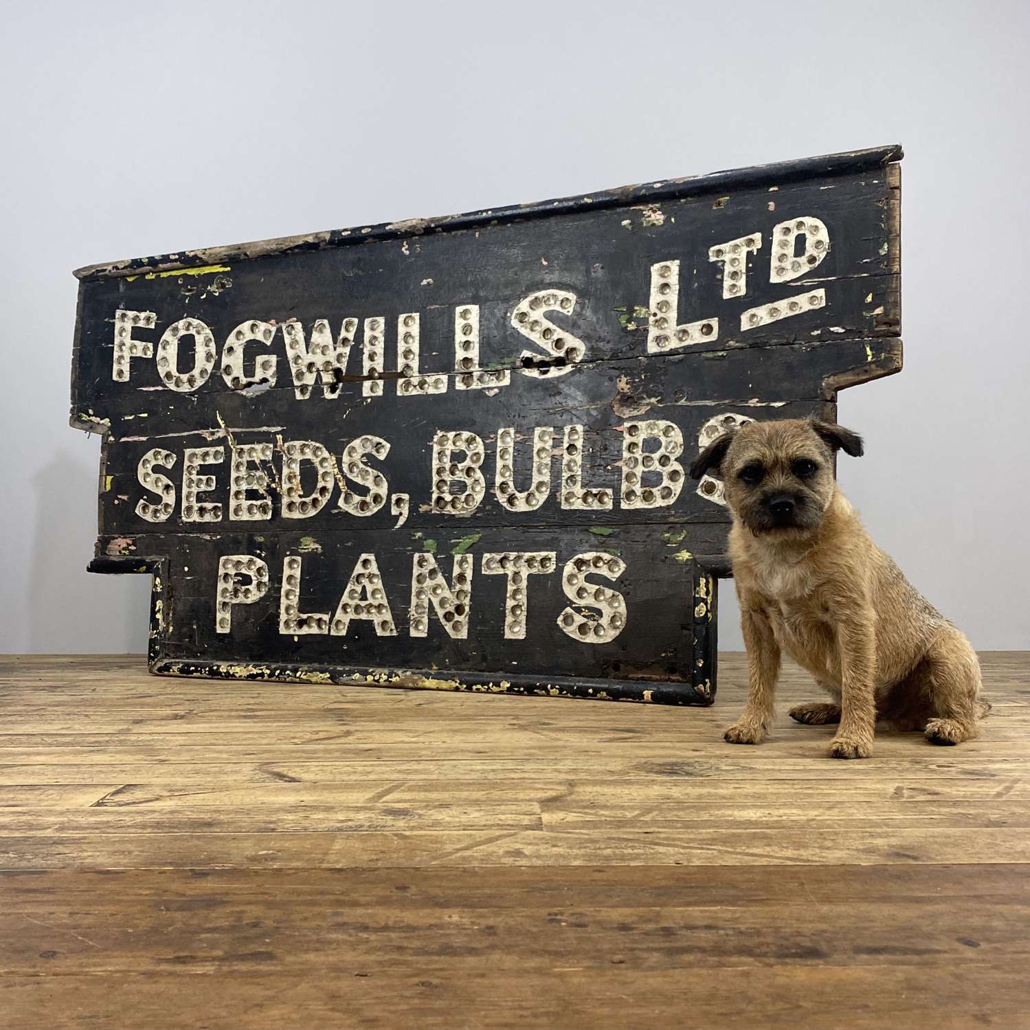 Antique wooden adverting sign