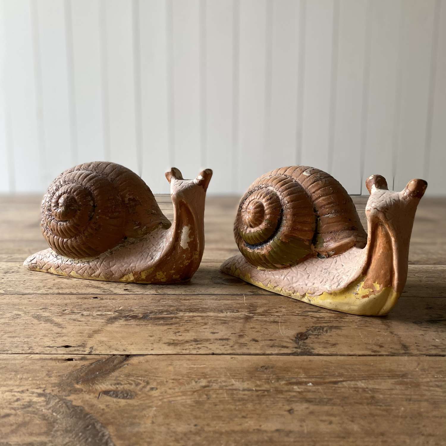 Weathered ceramic snails