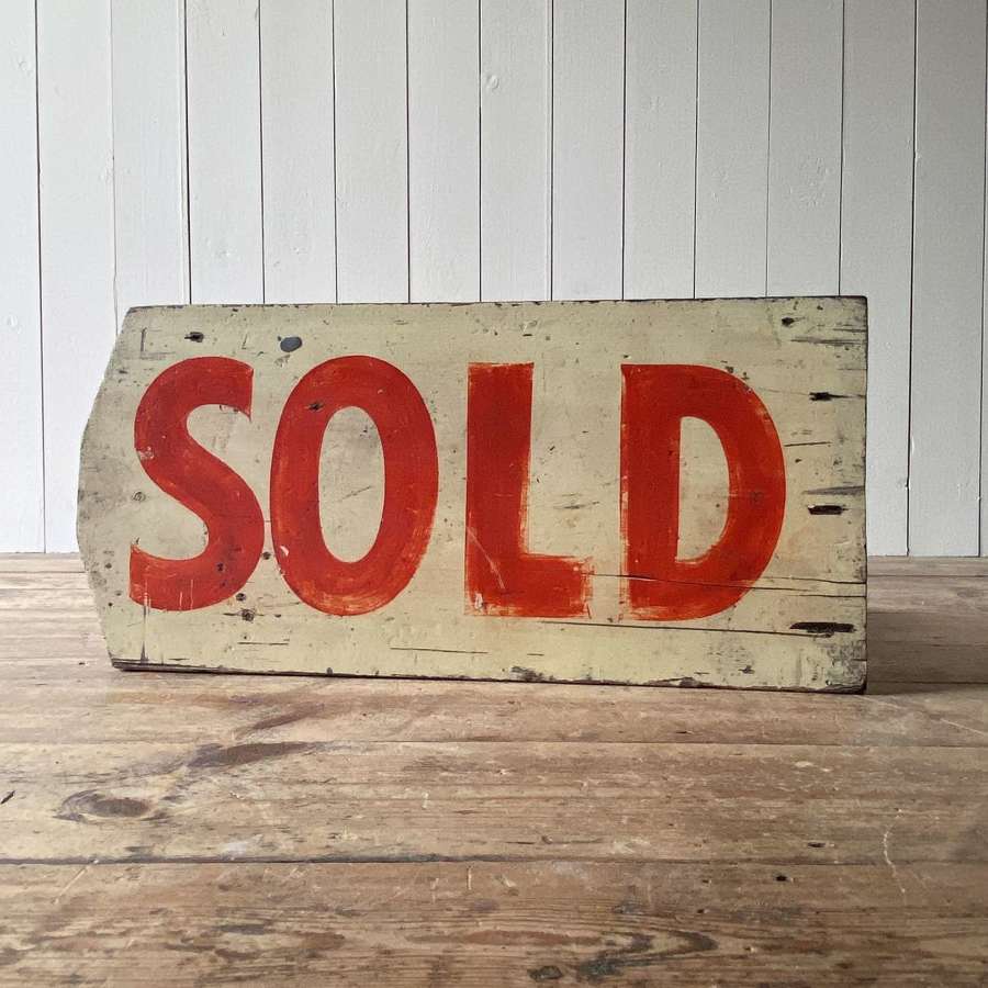 Vintage wooden sold sign