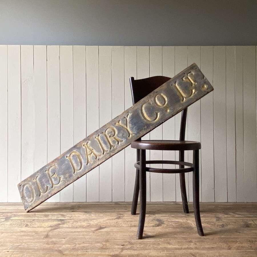 Antique wooden dairy sign
